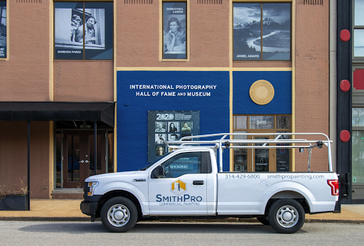SmithPro Commercial Painting truck in front of the International Photography Hall of Fame and Museum